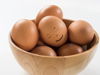 sleeping eggs in a wooden bowl