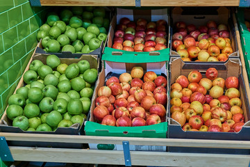 Fresh appetizing fruit on the counter in the store