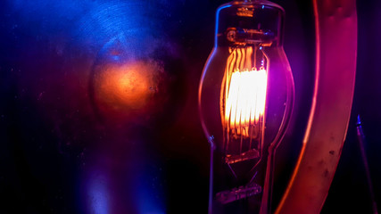 Filament of tungsten on when applying an electrical voltage