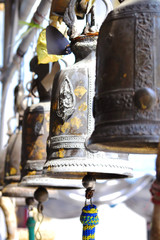 Fototapeta na wymiar Thai style bells hanging around Thai temple in Thailand 