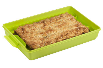 Portable cake container on white background with cake