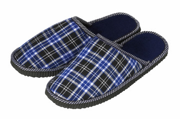 Pair of checked blue slippers on white background