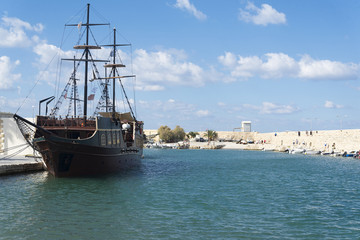 Boathouse on the acute Crete in a Sunny day.