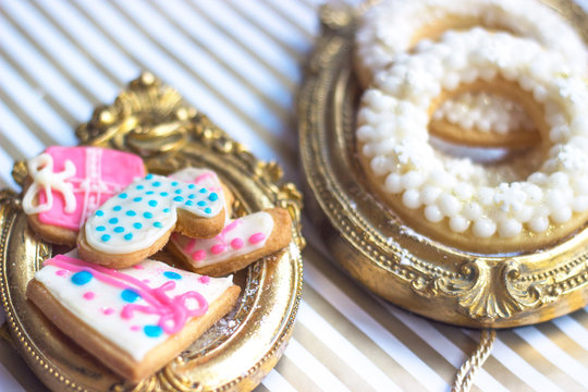 Close up of homemade  Christmas or winter theme cookies, served on vintage golden picture frame or trail