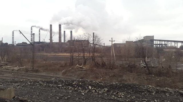 Smoke from the pipe. Mining and processing plant. Ukraine. Krivoy Rog