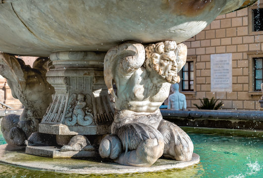 The Sculptures of Fountain of Shame or Praetorian Fountain at the Pretoria square in Palermo, Sicily, Italy