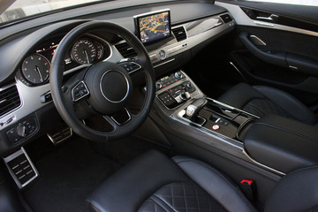  View of the interior of a modern automobile showing the dashboard