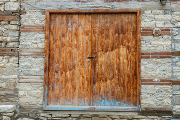 Fototapeta na wymiar Door of The oldest house in Lahic mountainous village made of stone in Azerbaijan
