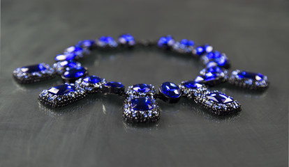 close up jewelry necklace on black background