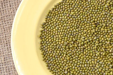 Green beans. Yellow large plate. Healthy food