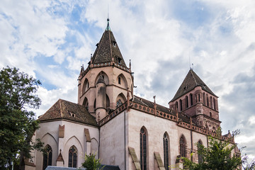 Obraz premium View of St. Thomas church with five naves in Strasbourg. The Protestant Church of Saint-Thomas (Eglise Saint-Thomas) is an excellent example of Alsatian Gothic art. Strasbourg, Alsace, France.