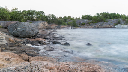 Seascape.Long exposure shot of sea and rocks
