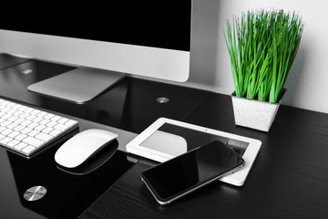 computer on a table in an office