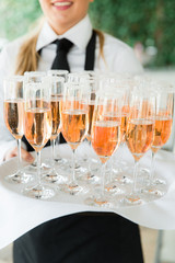 Tray filled with champagne glasses