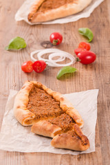 Turkish pide pizza with meat and onion. 