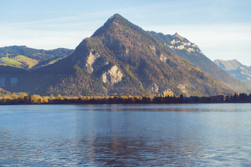 Beautiful view of mountain with lake Against blue sky