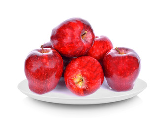 Apples in white plate on white background