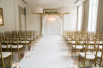 Elegant indoor wedding ceremony set up