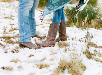 couple wearing cowboy boots