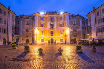 Obraz premium Square Piazza Sant Ignazio, located in the historic center of Rome, in front of the Church of St Ignatius of Loyola at Campus Martius, at night, Italy.