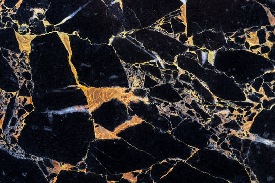 golden black marble texture backdrop with detail structure