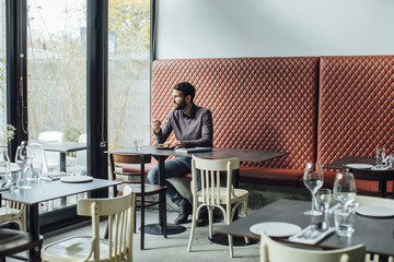 Man Eating at Restaurant