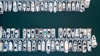 Drone view of a marina with boats and yachts - Powered by Adobe