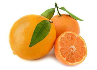 Oranges with leaves on white background