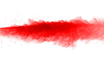 abstract powder splatted background. Red powder explosion on black background. Colored cloud. Colorful dust explode. Paint Holi.