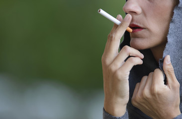 Beautiful woman enjoying a cigarette.