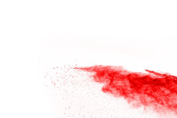 abstract powder splatted background. Red powder explosion on black background. Colored cloud. Colorful dust explode. Paint Holi.