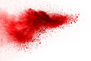 abstrakter pulverbespritzter hintergrund. Rote Pulverexplosion auf schwarzem Hintergrund. Farbige Wolke. Bunter Staub explodiert. Male Holi. © kitsana