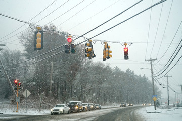 traffic light and street scene in the snowing day