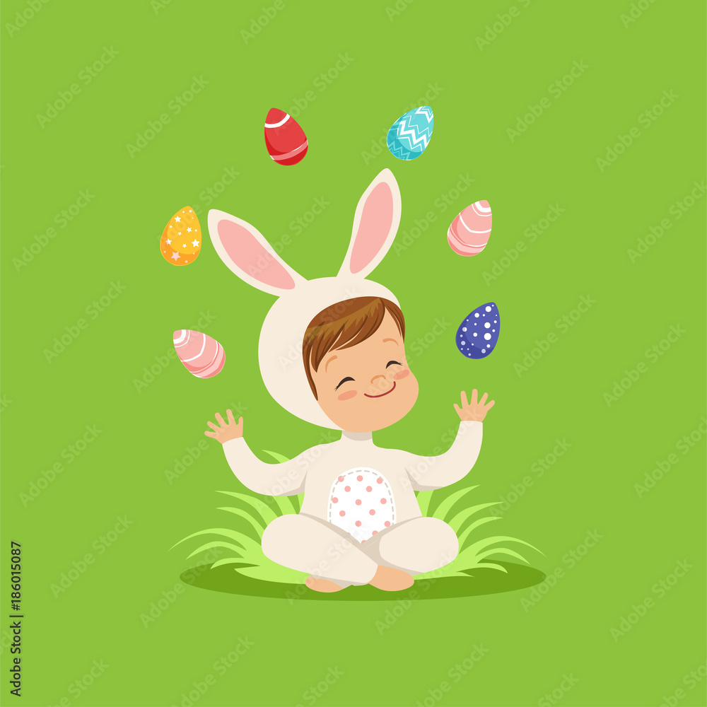 Sticker Cute little boy in bunny costume sitting on the grass juggling with painted eggs, kid having fun on Easter egg hunt vector Illustration