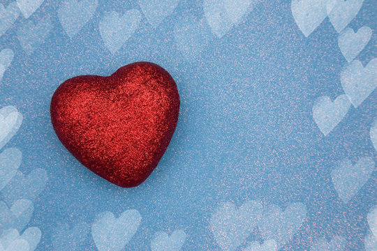 Valentines Themed Background on a Blue Glitter