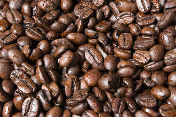 Coffee fried grains close-up background, texture