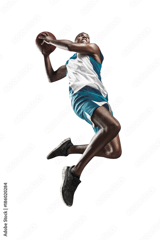 Wall mural Full length portrait of a basketball player with ball