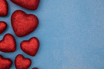 Valentines Themed Background on a Blue Glitter