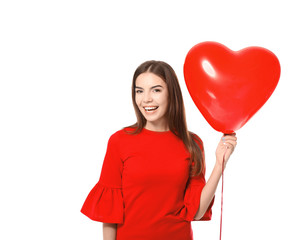 Romantic young woman with heart-shaped balloon for Valentine's Day on white background