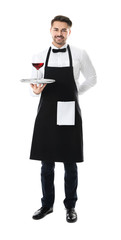 Waiter holding tray with glass of red wine on white background