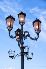 Fototapeta na wymiar Ornamental classic iron streetlights