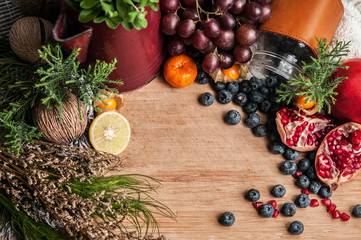 Healthy eating different fruits and burries wooden background. Copy space, top view