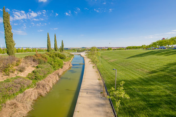Fototapeta premium landscape of waterway in public park named Juan Carlos, in Madrid city, Spain 