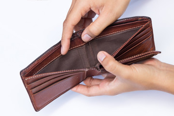 Empty A wallet,The wallet is in man's hand on white background.