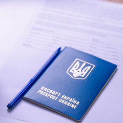 Ukrainian passport with documents and stamps