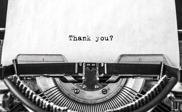 Thank you word typed on a Vintage Typewriter.