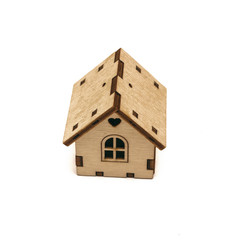 Small toy house home isolated on white background.