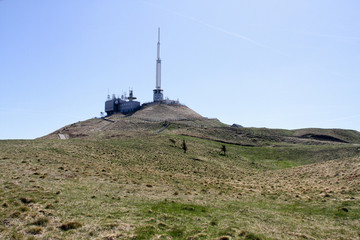 Fototapeta na wymiar Antenna on a volcano mountain in France
