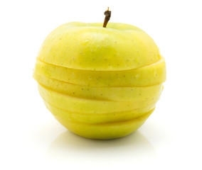 Sliced apple (Smeralda variety) isolated on white background one whole.