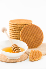 Dutch Waffles with honey on white background